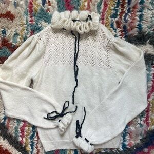 preppy bow knit sweater with high neck, ruffles, and velvet bows